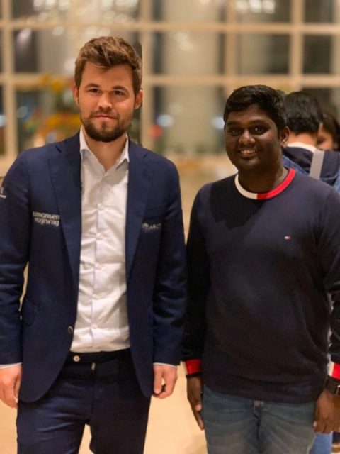 Arun Manukonda with Magnus Carlsen